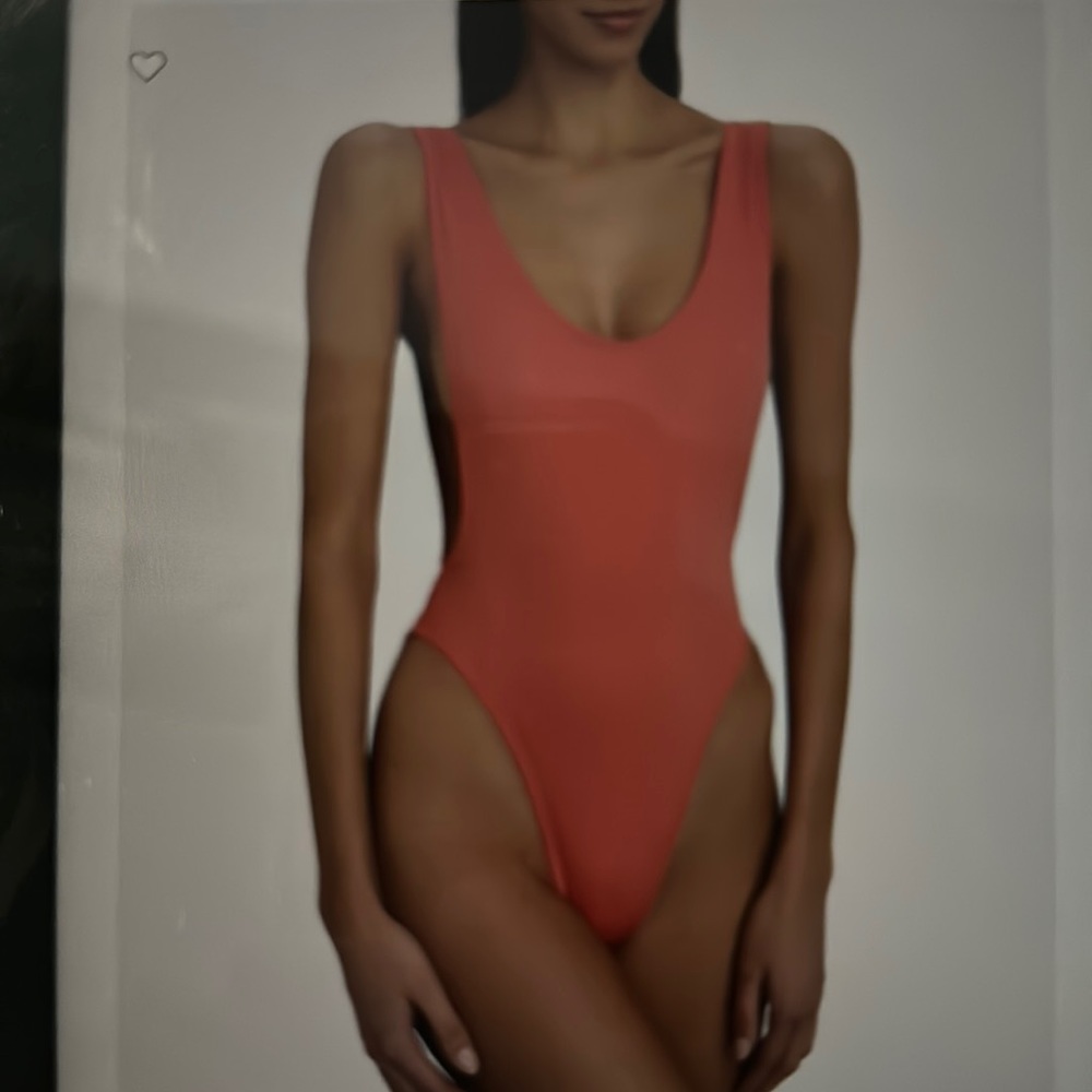 Norma Kamali pink one piece color papaya